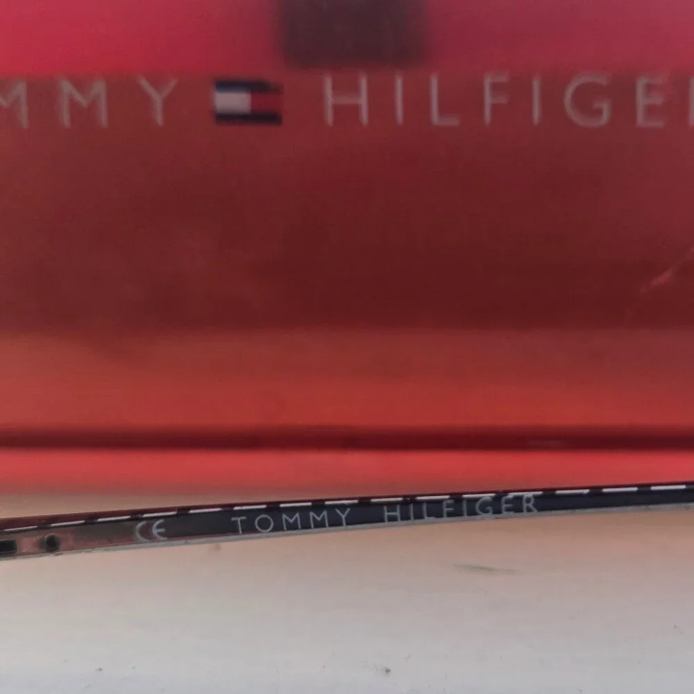 Tommy Hilfiger prescription glasses, lenses, and red case